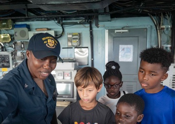 Guam Homeschool Association tours USS Emory S. Land