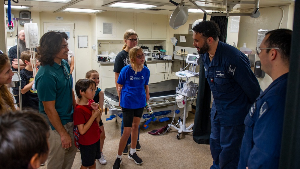 Guam Homeschool Association tours USS Emory S. Land