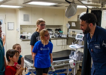 Guam Homeschool Association tours USS Emory S. Land