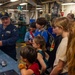 Guam Homeschool Association tours USS Emory S. Land
