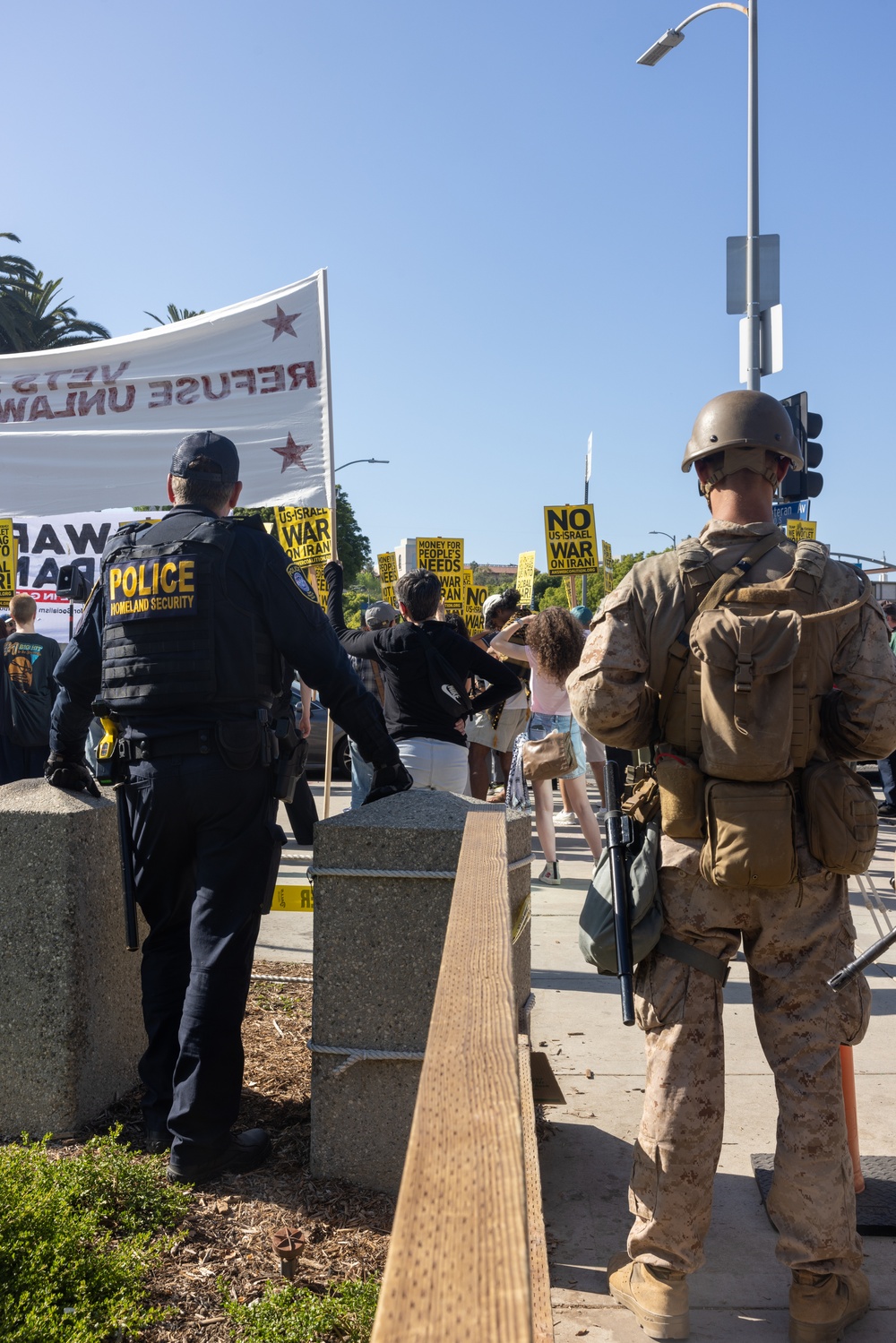 U.S. Marines, Department of Homeland Security police, FBI police guard federal building