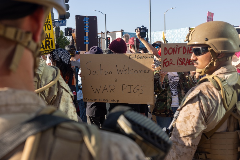 U.S. Marines, Department of Homeland Security police, FBI police guard federal building