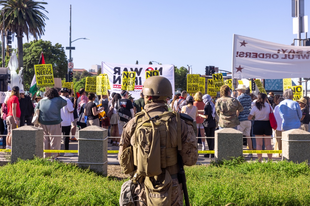 U.S. Marines, Department of Homeland Security police, FBI police guard federal building