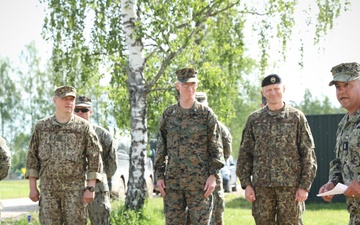 U.S., Latvian Forces Commemorate Hut Completion During BALTOPS 25