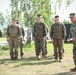 U.S., Latvian Forces Commemorate Hut Completion During BALTOPS 25