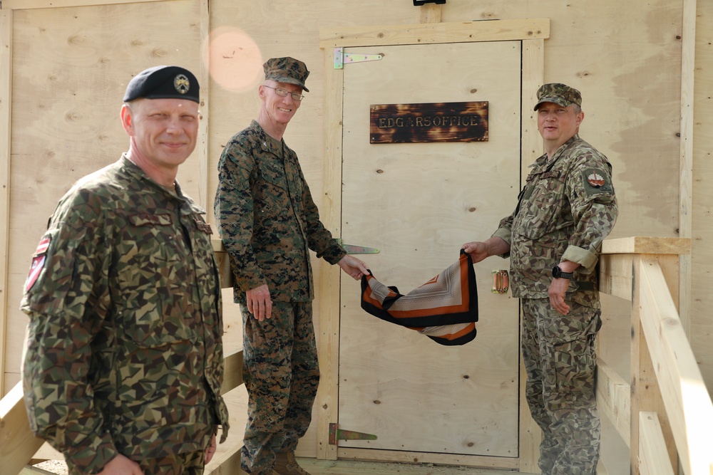 U.S., Latvian Forces Commemorate Hut Completion During BALTOPS 25