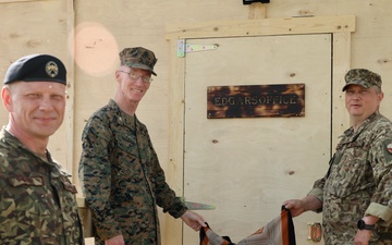 U.S., Latvian Forces Commemorate Hut Completion During BALTOPS 25