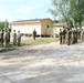 U.S., Latvian Forces Commemorate Hut Completion During BALTOPS 25