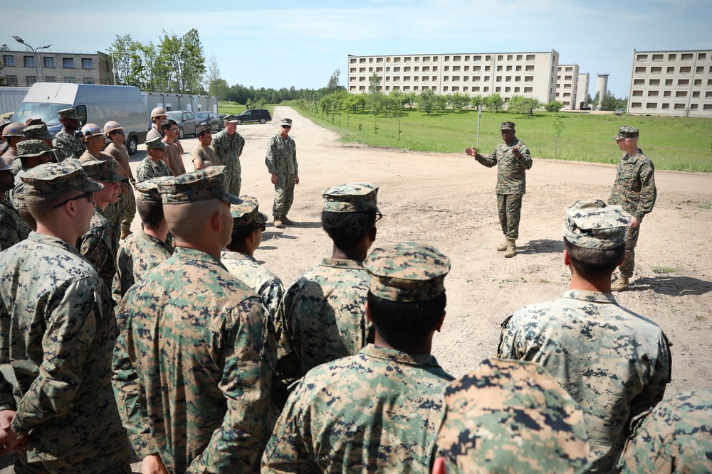 U.S., Latvian Forces Commemorate Hut Completion During BALTOPS 25