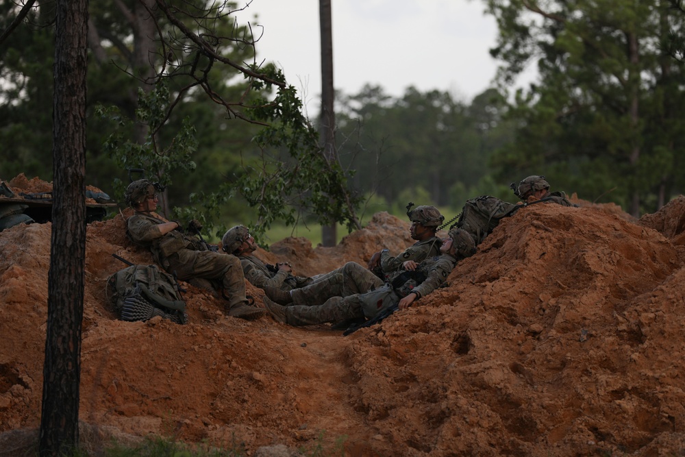 Soldiers rest before base defense at JRTC