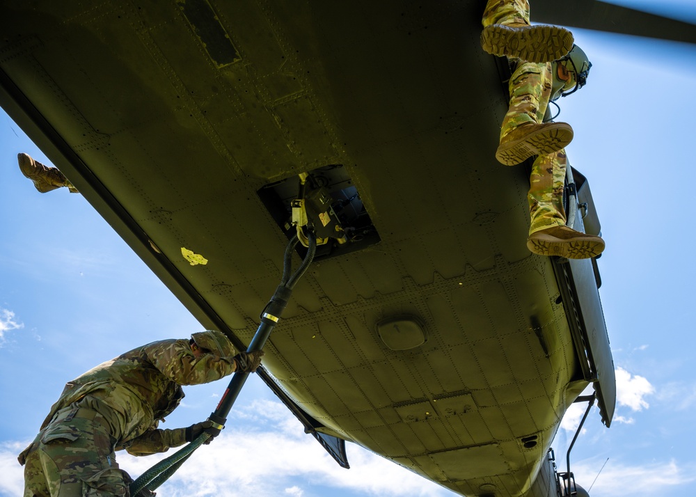 Ark. Artillerymen Conduct Sling Load At Chaffee