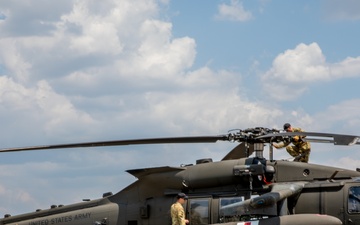 12th Combat Aviation Brigade Soldiers conduct MEDEVAC hoist training with a UH-60 Black Hawk helicopter