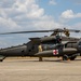 12th Combat Aviation Brigade Soldiers conduct MEDEVAC hoist training with a UH-60 Black Hawk helicopter