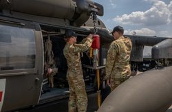12th Combat Aviation Brigade Soldiers conduct MEDEVAC hoist training with a UH-60 Black Hawk helicopter [Image 3 of 14]