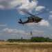 12th Combat Aviation Brigade Soldiers conduct MEDEVAC hoist training with a UH-60 Black Hawk helicopter