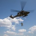 12th Combat Aviation Brigade Soldiers conduct MEDEVAC hoist training with a UH-60 Black Hawk helicopter