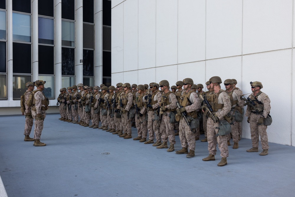 U.S. Marine reenlists at federal building