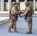 U.S. Marine reenlists at federal building