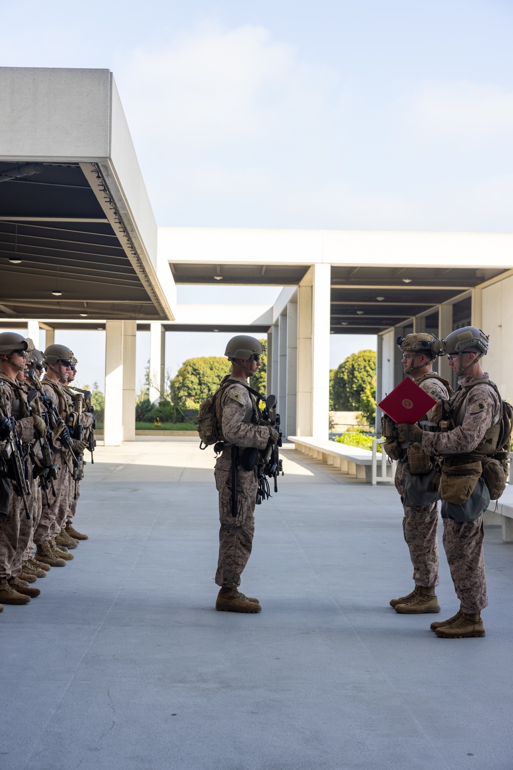 U.S. Marine reenlists at federal building