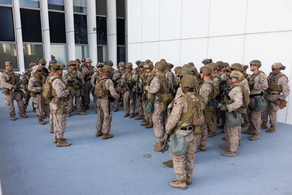 U.S. Marine reenlists at federal building