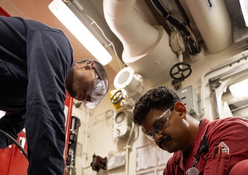 USS Curtis Wilbur (DDG 54) Sailors Conduct Maintenance
