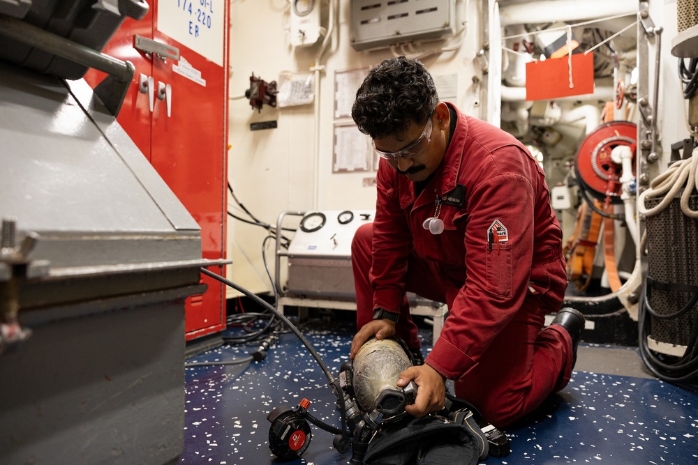 Curtis Wilbur Sailor Conducts Maintenance