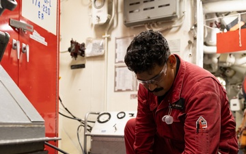Curtis Wilbur Sailor Conducts Maintenance
