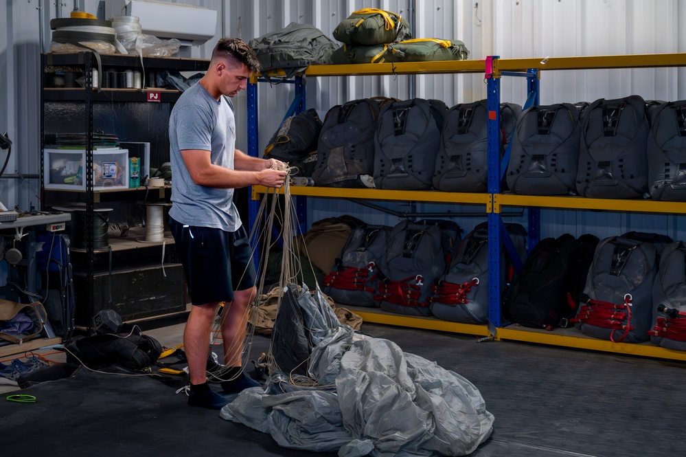 82nd Expeditionary Rescue Squadron Aircrew Flight Equipment Parachute Rigger Maintains Mission Readiness