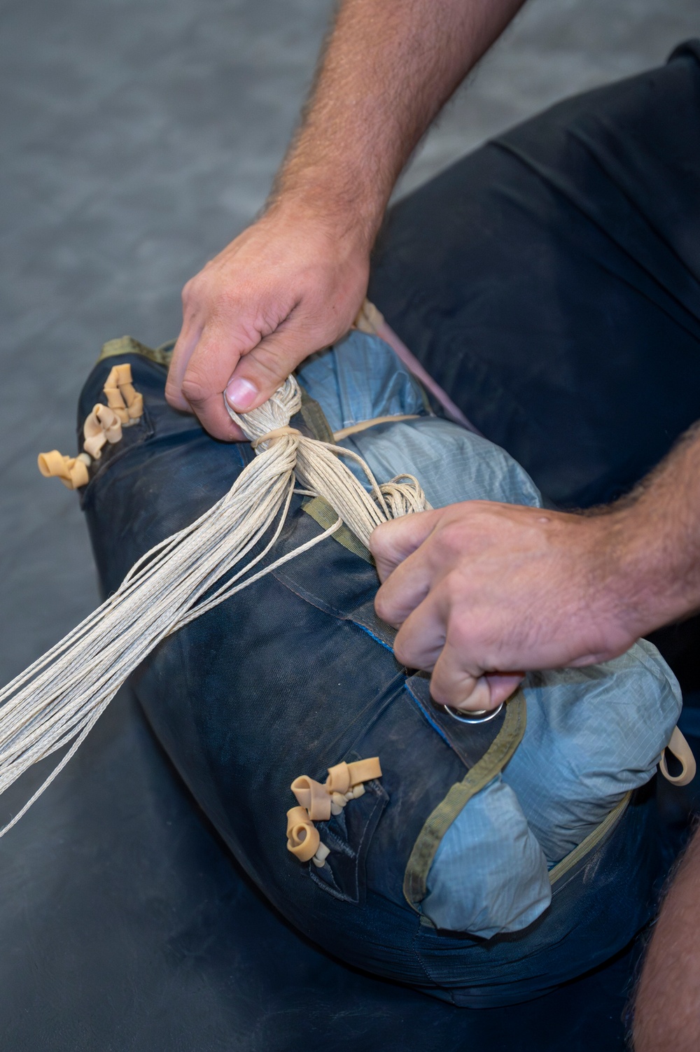 82nd Expeditionary Rescue Squadron Aircrew Flight Equipment Parachute Rigger Maintains Mission Readiness