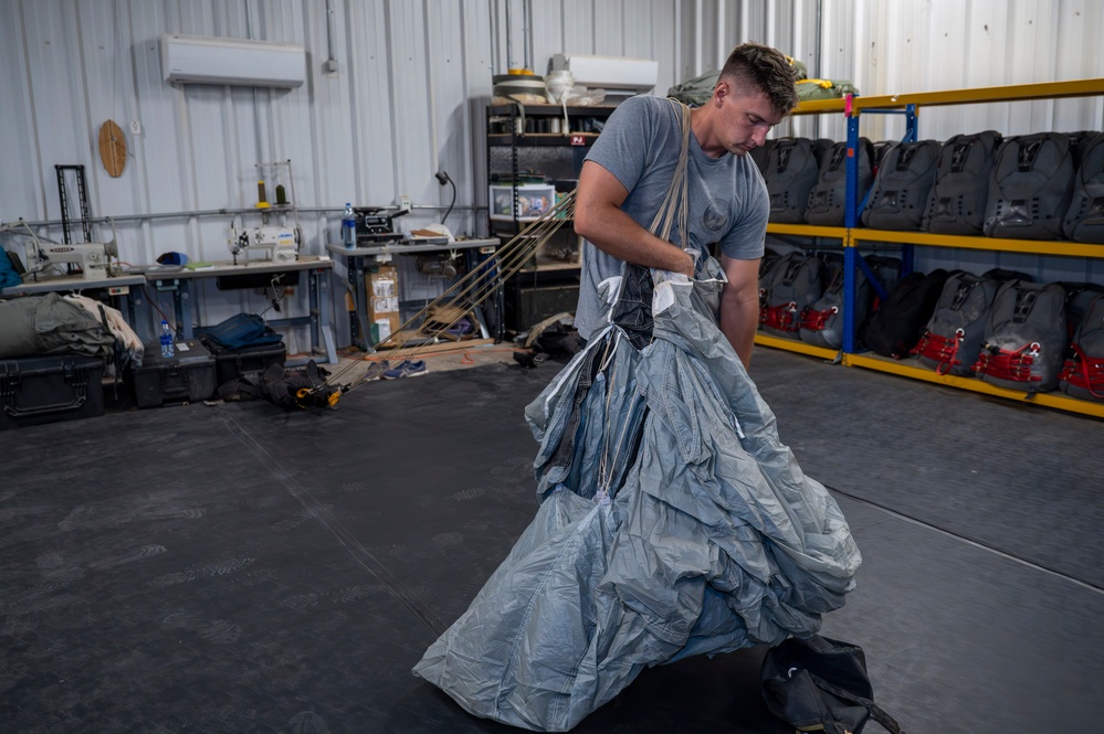 82nd Expeditionary Rescue Squadron Aircrew Flight Equipment Parachute Rigger Maintains Mission Readiness