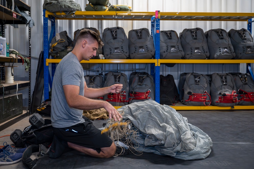 82nd Expeditionary Rescue Squadron Aircrew Flight Equipment Parachute Rigger Maintains Mission Readiness