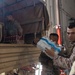 U.S. Marines distribute food delivered by California Army National Guard