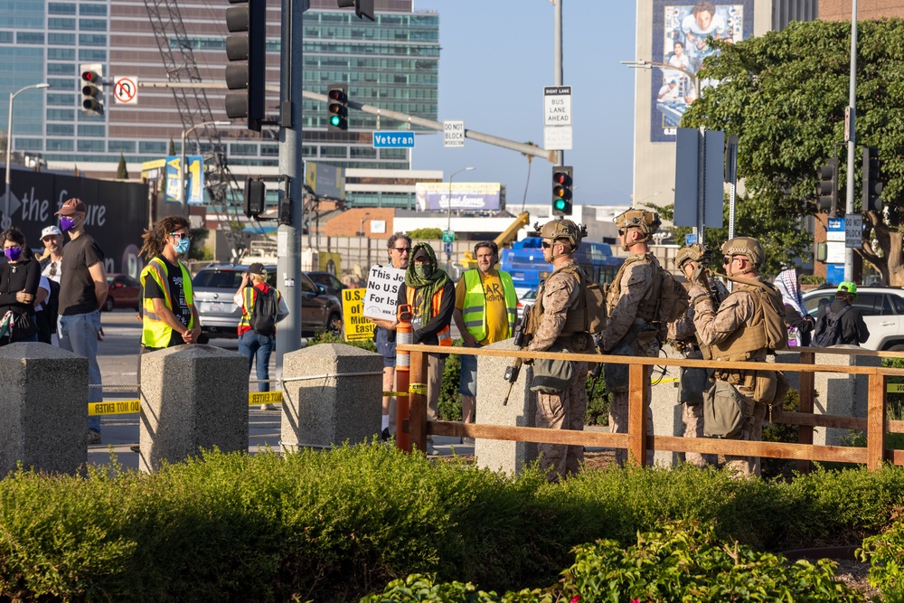 U.S. Marines, Department of Homeland Security police guard federal building