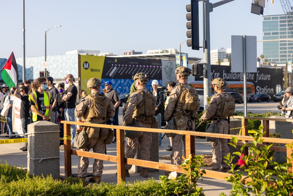 U.S. Marines, Department of Homeland Security police guard federal building