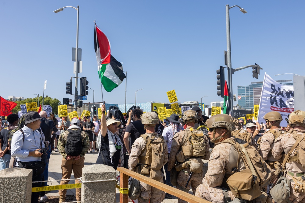 U.S. Marines continue to guard federal building