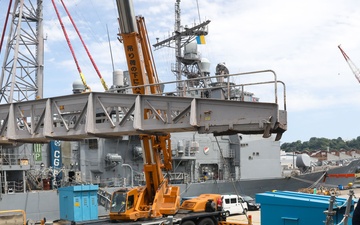 Sailors aboard the USS John Finn conduct a sea and anchor detail in Yokosuka, Japan