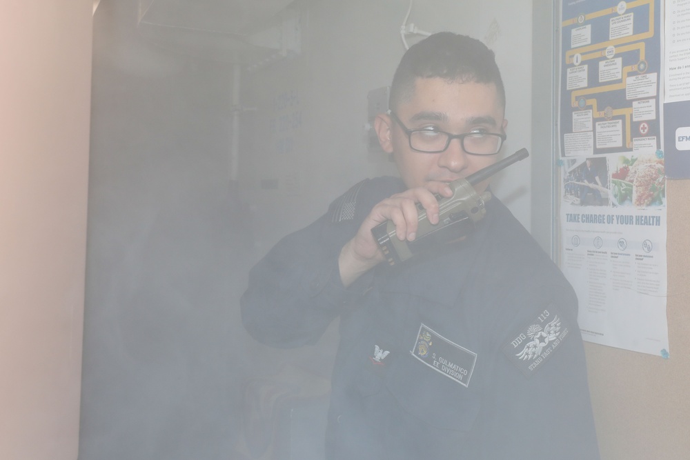 Sailors aboard the USS John Finn conduct a firefighting drill in Sagami Wan
