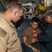 Sailors aboard the USS John Finn conduct a medical training team drill in Sagami Wan