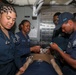 Sailors aboard the USS John Finn conduct a medical training team drill in Sagami Wan