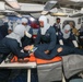 Sailors aboard the USS John Finn conduct a medical training team drill in Sagami Wan