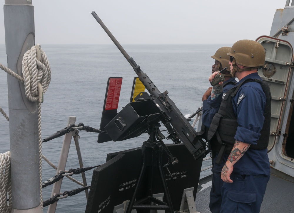 Sailors aboard the USS John Finn conduct a sea and anchor detail in Yokosuka, Japan