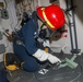 Sailors aboard the USS John Finn conduct a general quarters drill in Sagami Wan