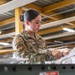 Airmen sort and organize incoming shipments
