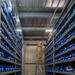 Airmen sort and organize incoming shipments