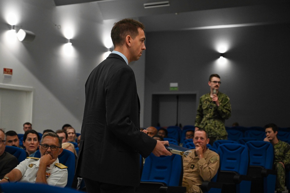 Naval History and Heritage Command provides a lecture at NAVSTA Rota