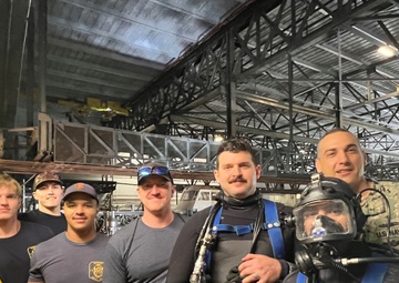 Navy Divers Clear the Way for International Submarine Races at Carderock