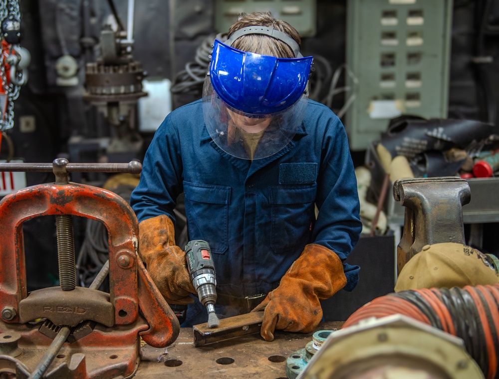 Hull Maintenance Technician's Conduct Maintenance onboard USS Essex (LHD 2)