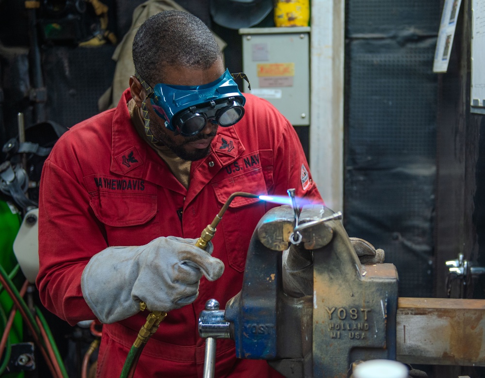 Hull Maintenance Technician's Conduct Maintenance onboard USS Essex (LHD 2)