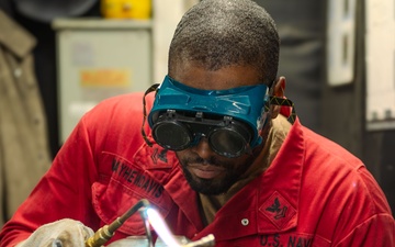 Hull Maintenance Technician's Conduct Maintenance onboard USS Essex (LHD 2)