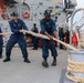 OSSN Lawrence Kim, STG3 Iyan Rosales and SN Samuel Ofori secure a mooring line